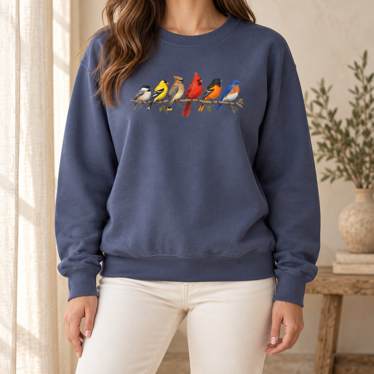 Colorful Birds on Branches sweatshirt in Denim — six painted songbirds on one branch: chickadee, goldfinch, cedar waxwing, northern cardinal, Baltimore oriole and eastern bluebird, on a garment-dyed Comfort Colors crewneck