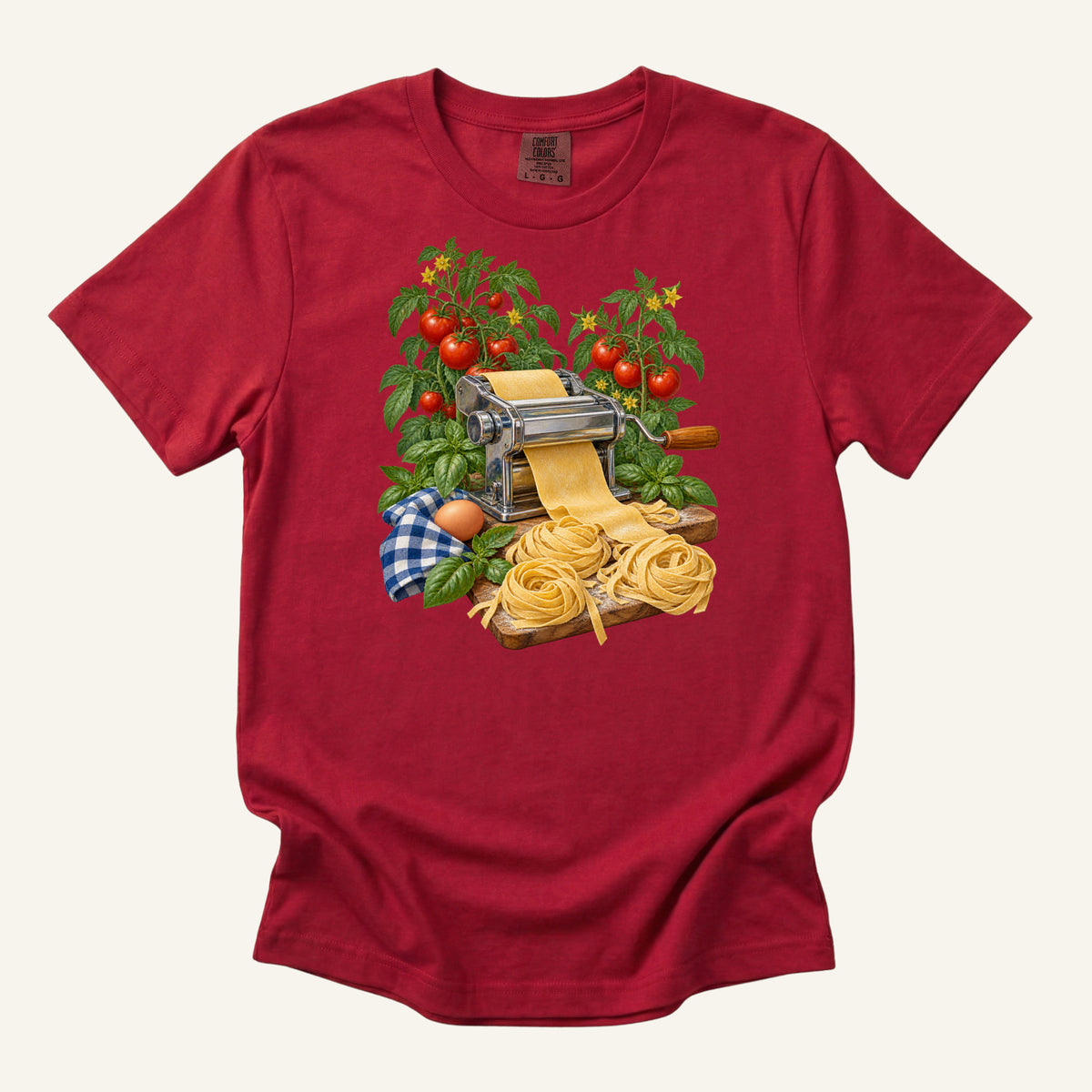 Dinner Takes a Little Longer handmade pasta t-shirt in Red, a true warm red — vintage pasta machine with fresh pasta, tomatoes and basil, garment-dyed Comfort Colors 1717 tee