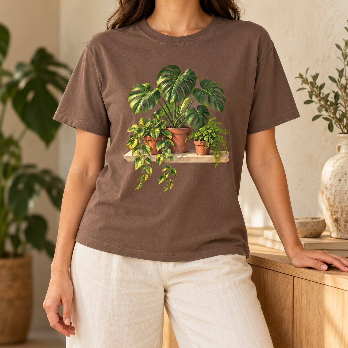 Houseplant t-shirt in Espresso – warm dark brown Comfort Colors tee with the trailing pothos, monstera and fern in terracotta pots