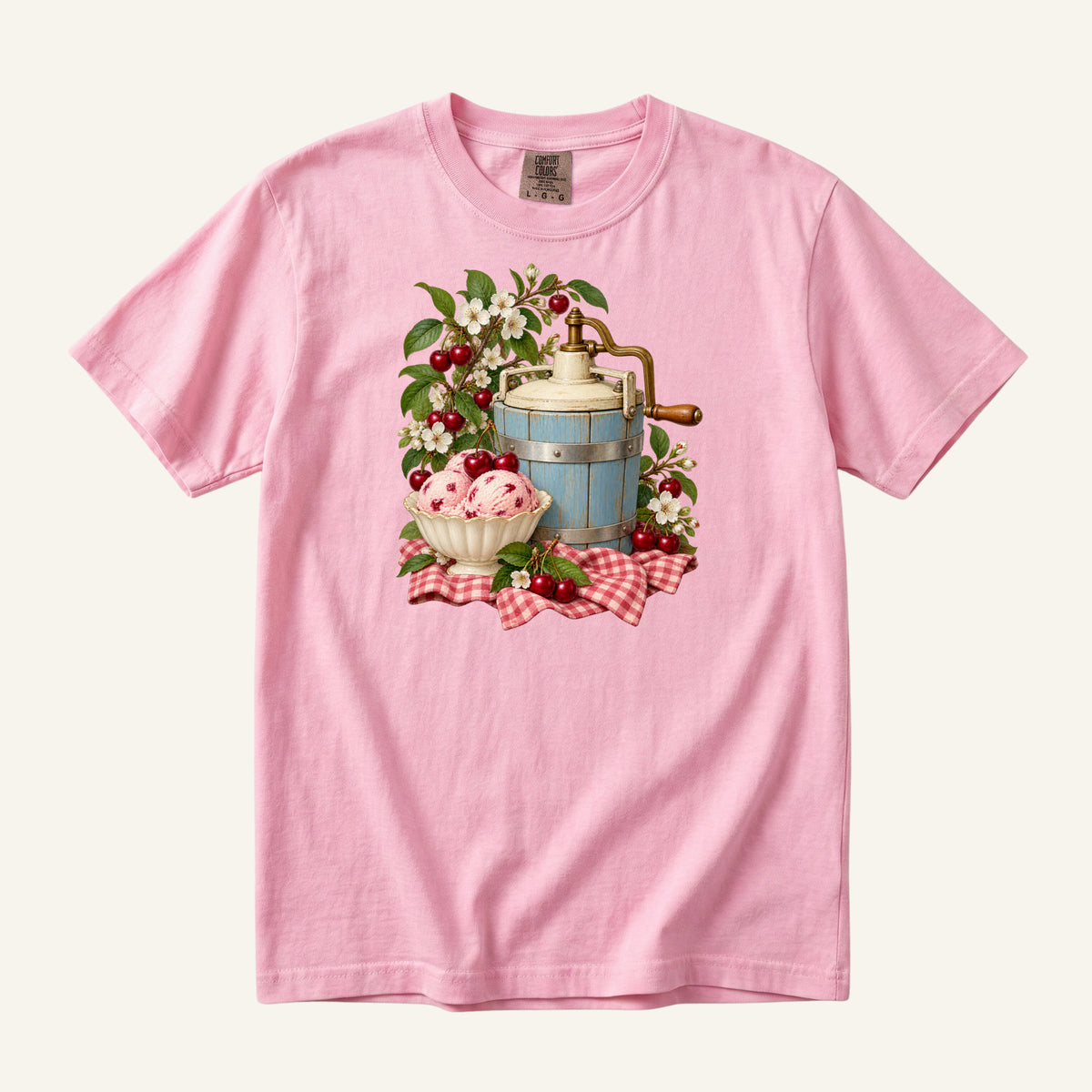 Vintage blue ice cream churn with a bowl of cherry ice cream, ripe cherries and red gingham, printed on a Blossom pink Comfort Colors 1717 unisex t-shirt