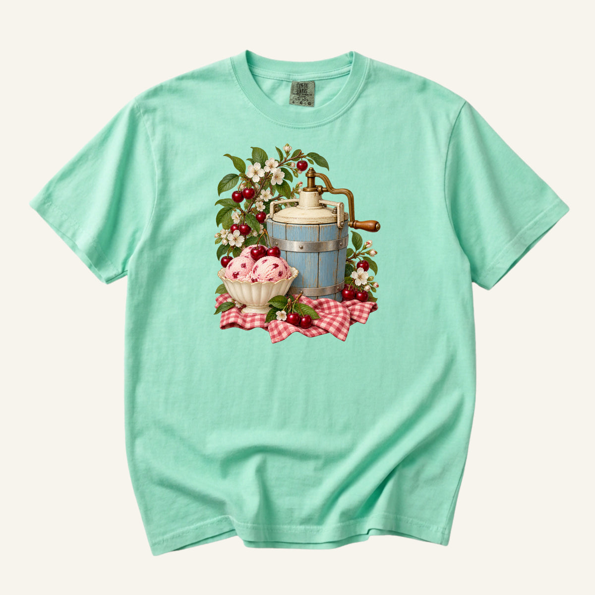 Vintage blue ice cream churn with a bowl of cherry ice cream, ripe cherries and red gingham, printed on an Island Reef aqua Comfort Colors 1717 unisex t-shirt