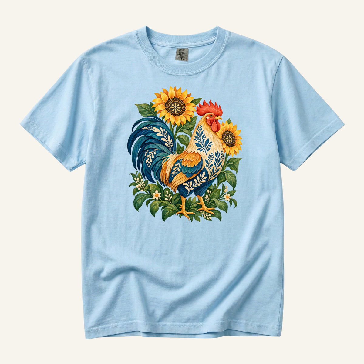 First One Up T-Shirt in Chambray — a light cool background giving the orange and yellow details clear contrast