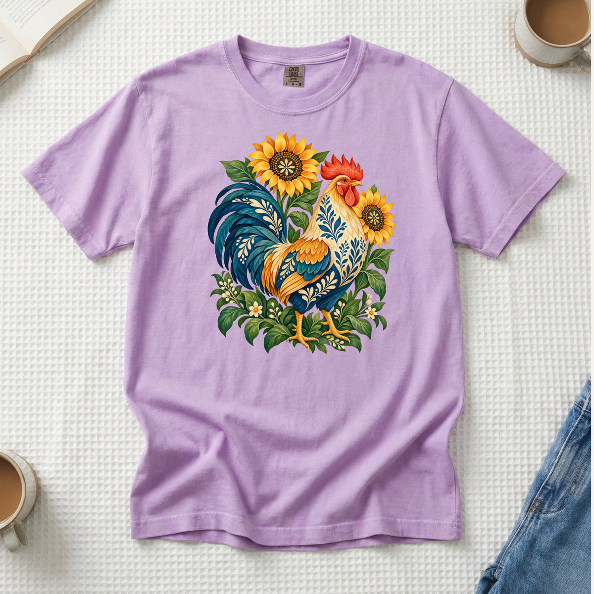 First One Up T-Shirt in Orchid — a playful purple complementing the golden flowers and blue plumage