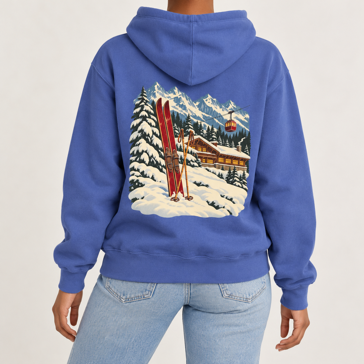 Vintage Ski Lodge hoodie in Flo Blue worn, back view of the mountain and chalet scene