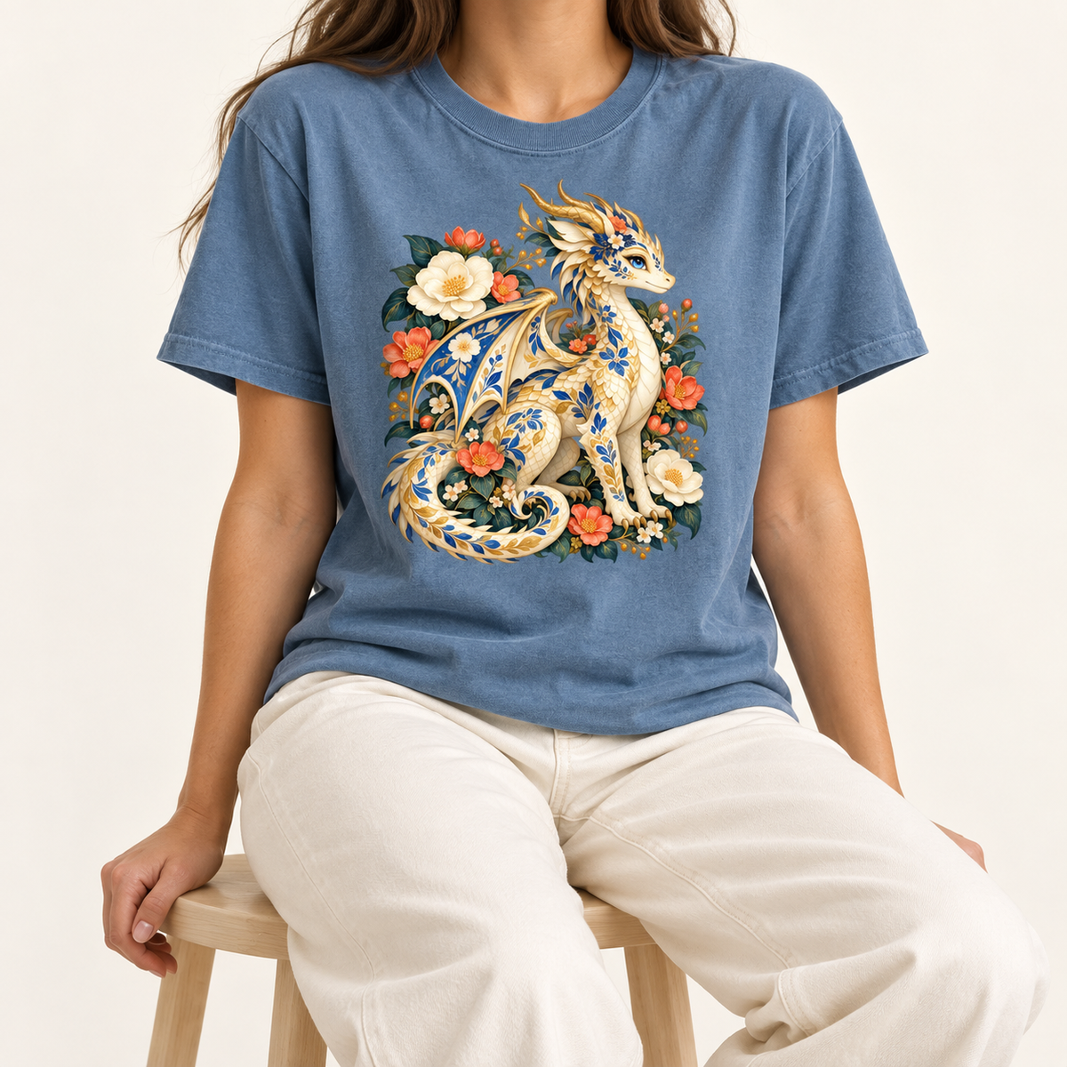 Coral-red flowers and ivory blossoms surrounding the seated dragon