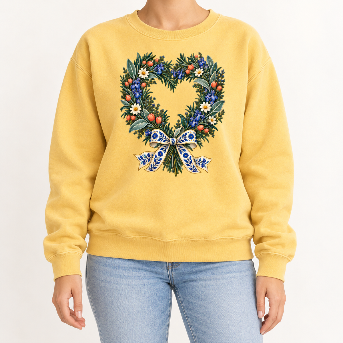 Blue flowers and curling green foliage in the folk-art heart wreath print
