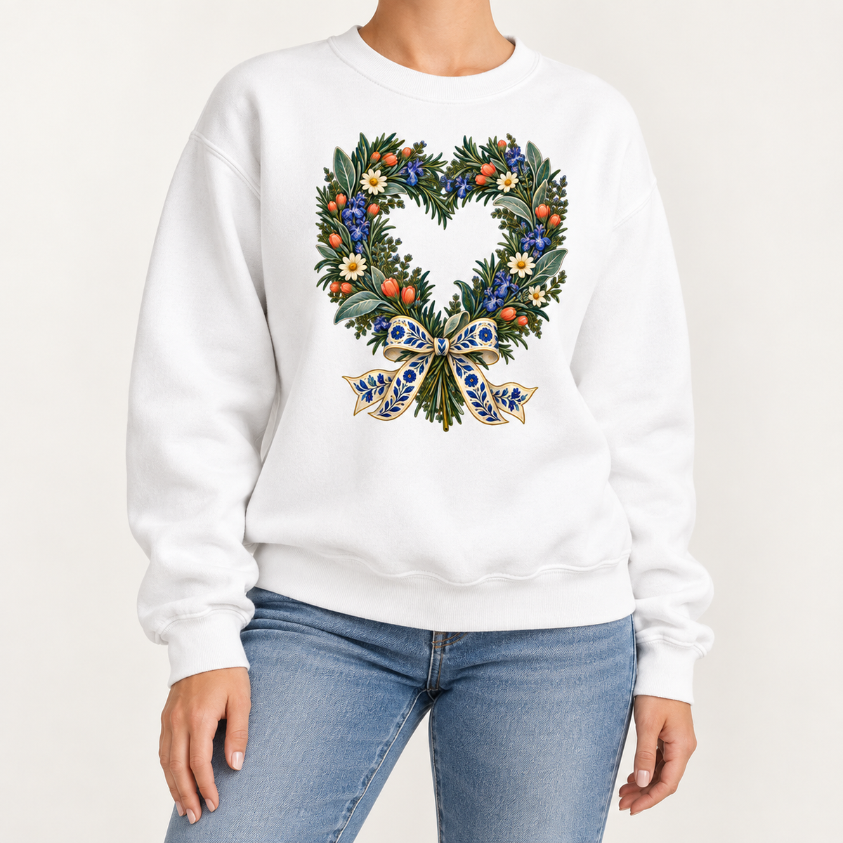 The heart wreath print centered on the chest of a relaxed-fit crewneck sweatshirt