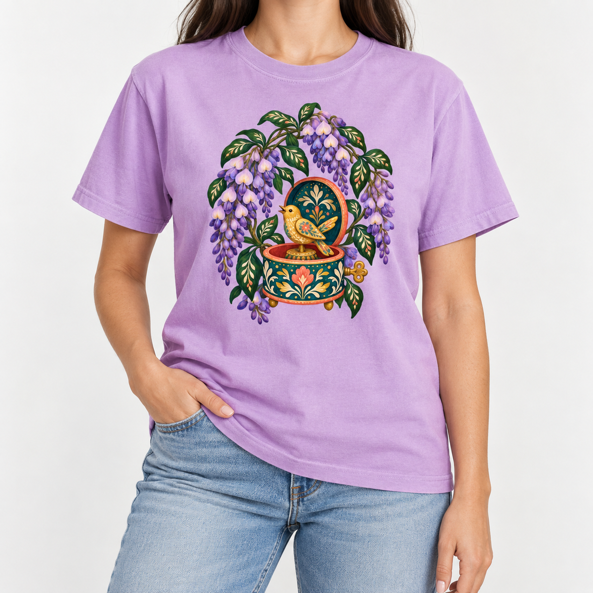 Floral music box t-shirt shown worn, closer view of the teal music box and purple wisteria