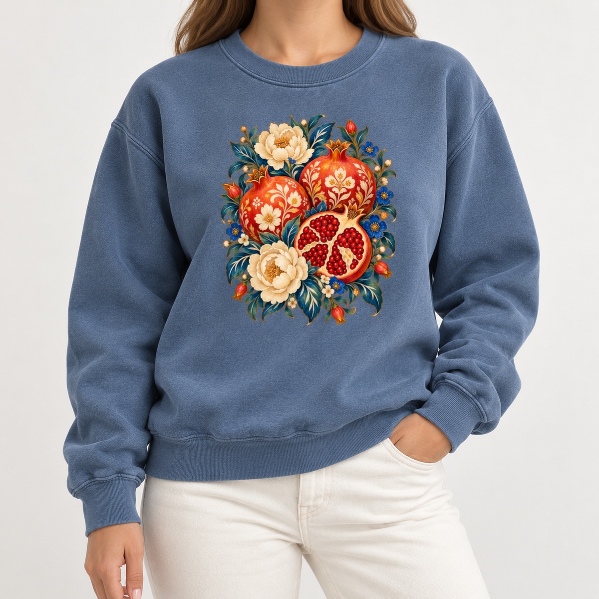 Floral pomegranate sweatshirt shown worn, showing the ribbed collar and cuffs