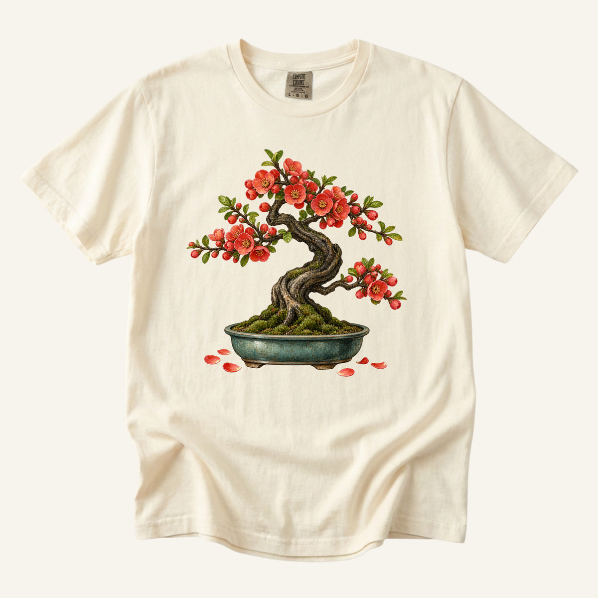 Flowering Bonsai Tree T-Shirt in Ivory — a twisting textured trunk with red blossoms in a shallow teal pot