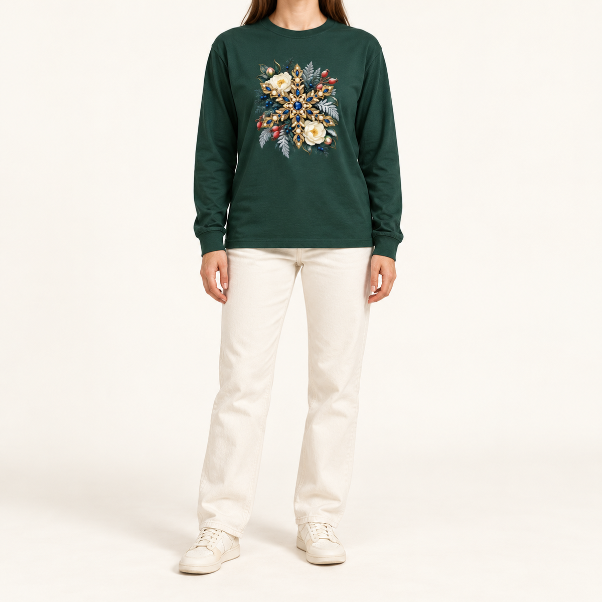Forest green 6 oz Airlume cotton long sleeve crewneck with the jeweled snowflake and winter floral print — a golden snowflake set with deep blue gemstones and pearls among cream flowers and frosted evergreen