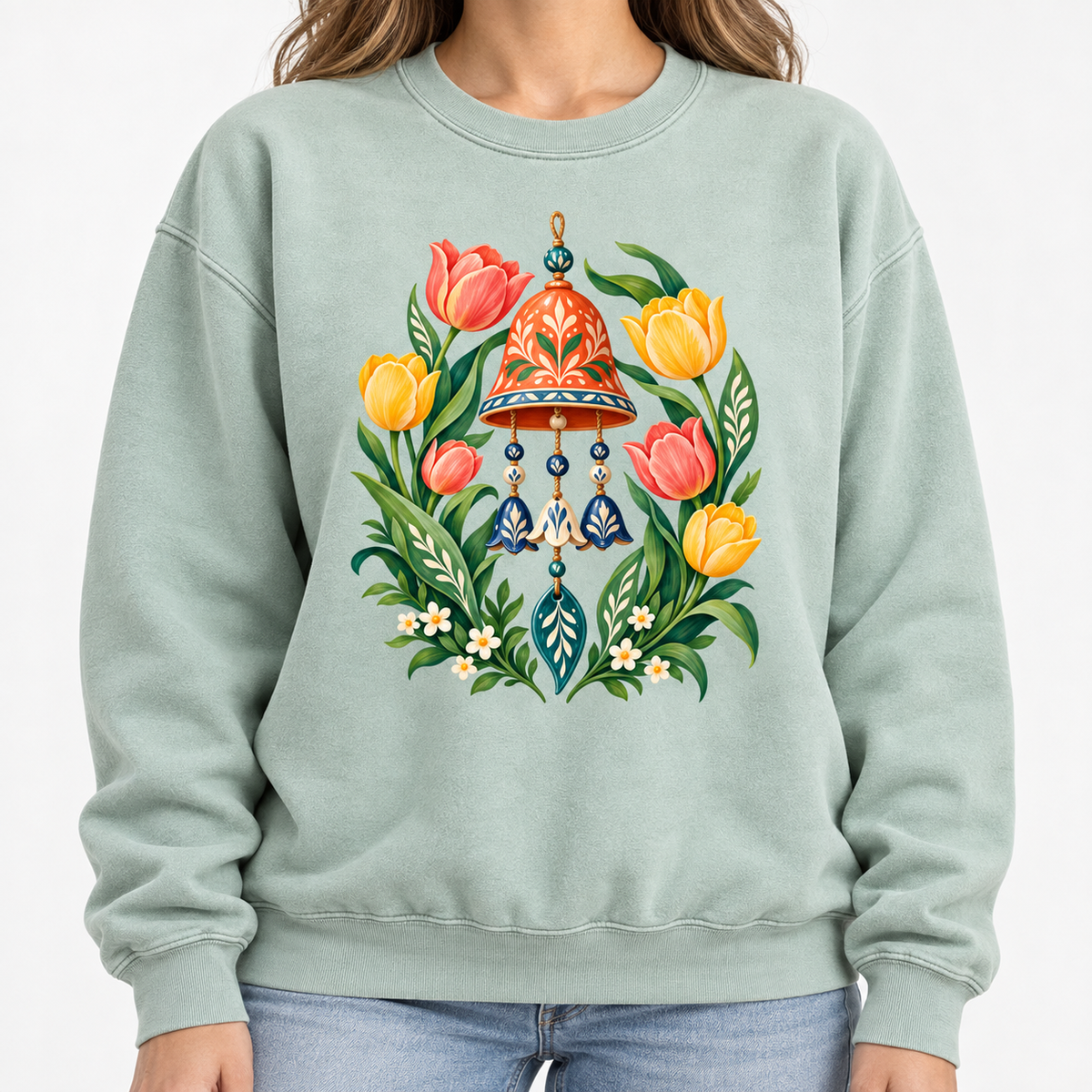 Garden wind chime and tulip sweatshirt shown worn, detail of the blue pendants and cream blossoms