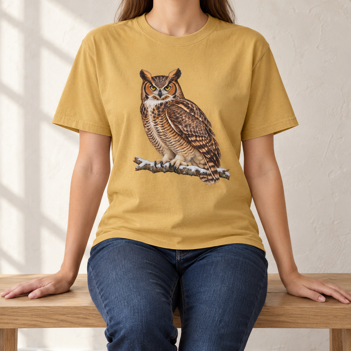 Great horned owl t-shirt in Mustard worn by a woman – the owl on a warm golden yellow Comfort Colors tee