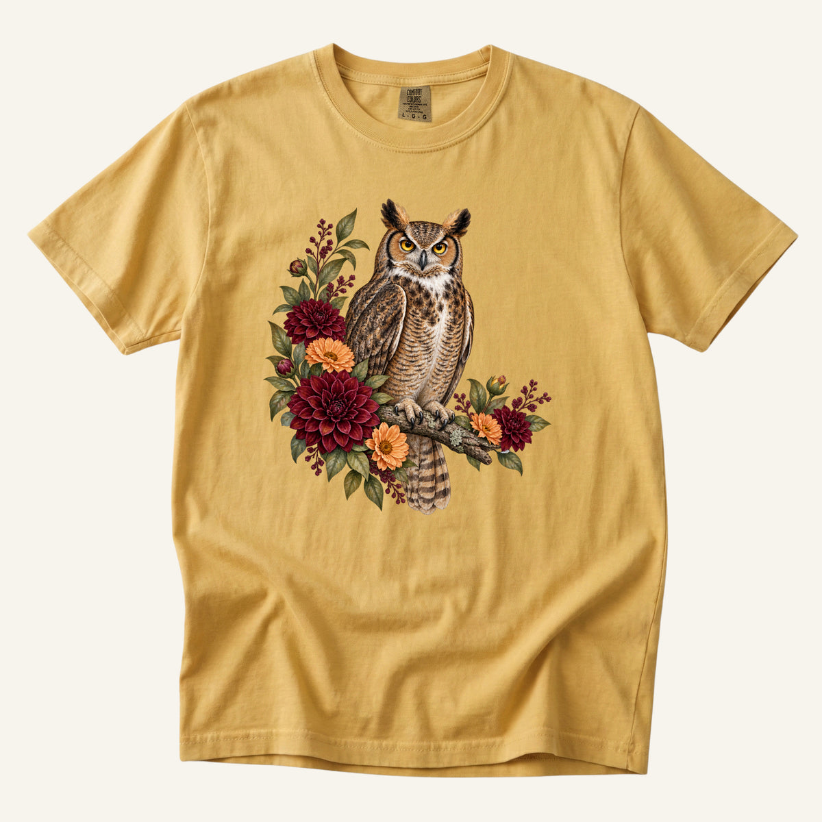 Great Horned Owl & Dahlia T-Shirt in Mustard — a great horned owl among dahlias on garment-dyed cotton