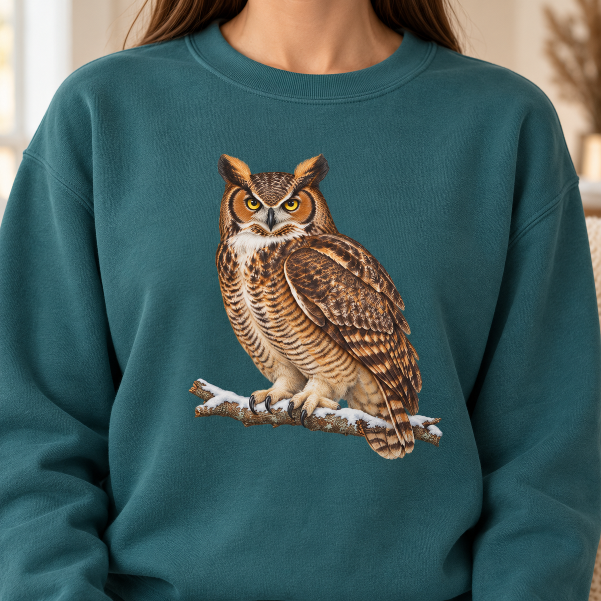 Great horned owl sweatshirt in Blue Spruce, flat view – watercolor owl on a snow-dusted branch printed on a garment-dyed Comfort Colors crewneck