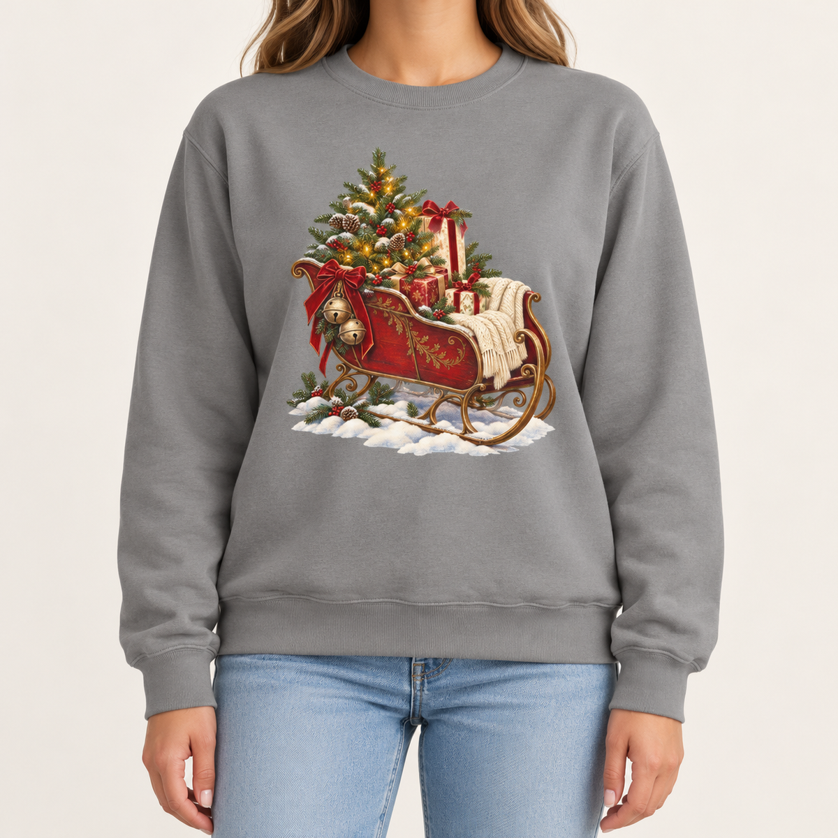Vintage Christmas sleigh sweatshirt in Grey – a cranberry-red sleigh with gold trim heaped with fresh-cut fir and hung with golden bells, printed large on the chest of a Comfort Colors crewneck