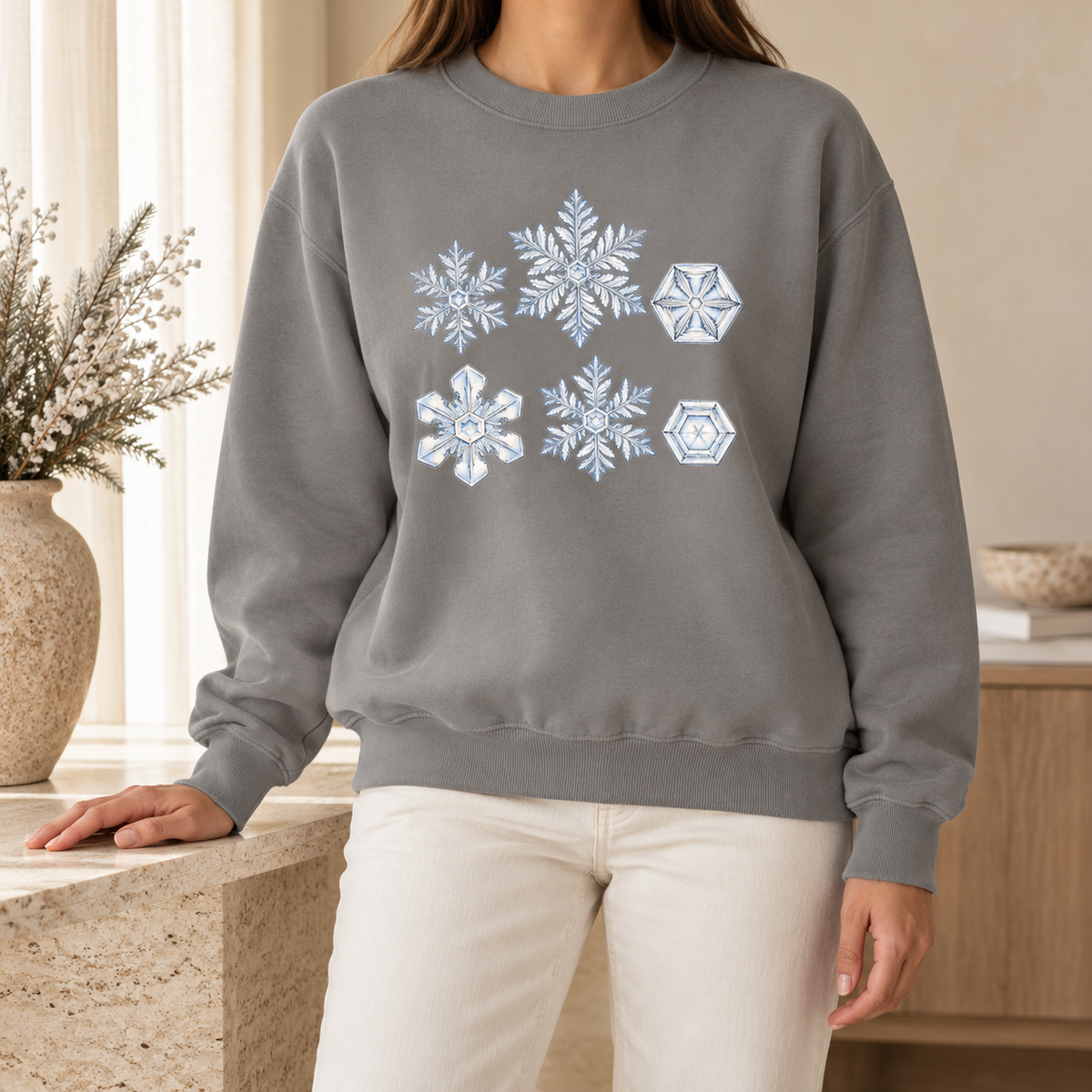 Snowflake Study Sweatshirt in Grey - six watercolor snow crystals on a heathered grey Comfort Colors crewneck, worn by a woman