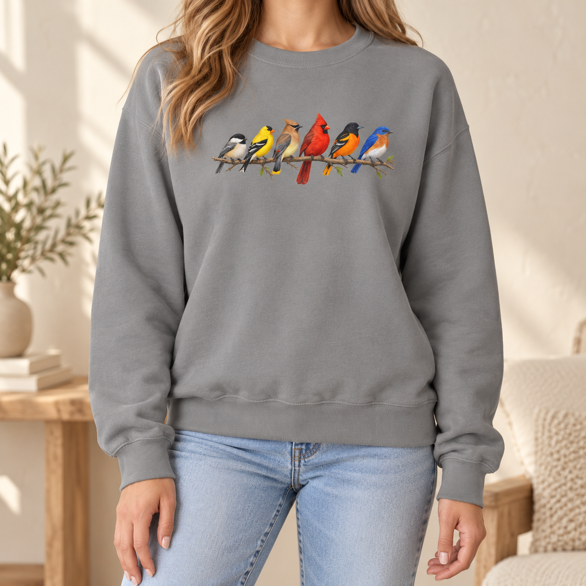 Colorful Birds on Branches sweatshirt in Grey — six painted songbirds on one branch: chickadee, goldfinch, cedar waxwing, northern cardinal, Baltimore oriole and eastern bluebird, on a garment-dyed Comfort Colors crewneck