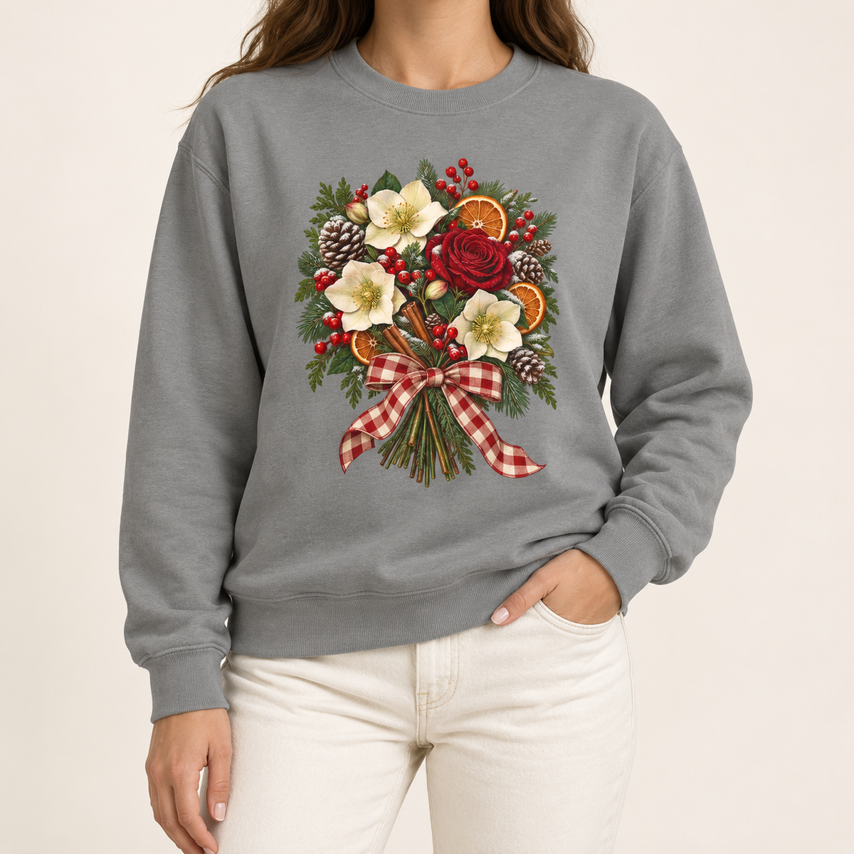Winter bouquet sweatshirt in Grey – cream hellebores, a red rose, dried orange slices, cinnamon and pinecones tied with a red gingham bow, printed large on the chest of a Comfort Colors crewneck