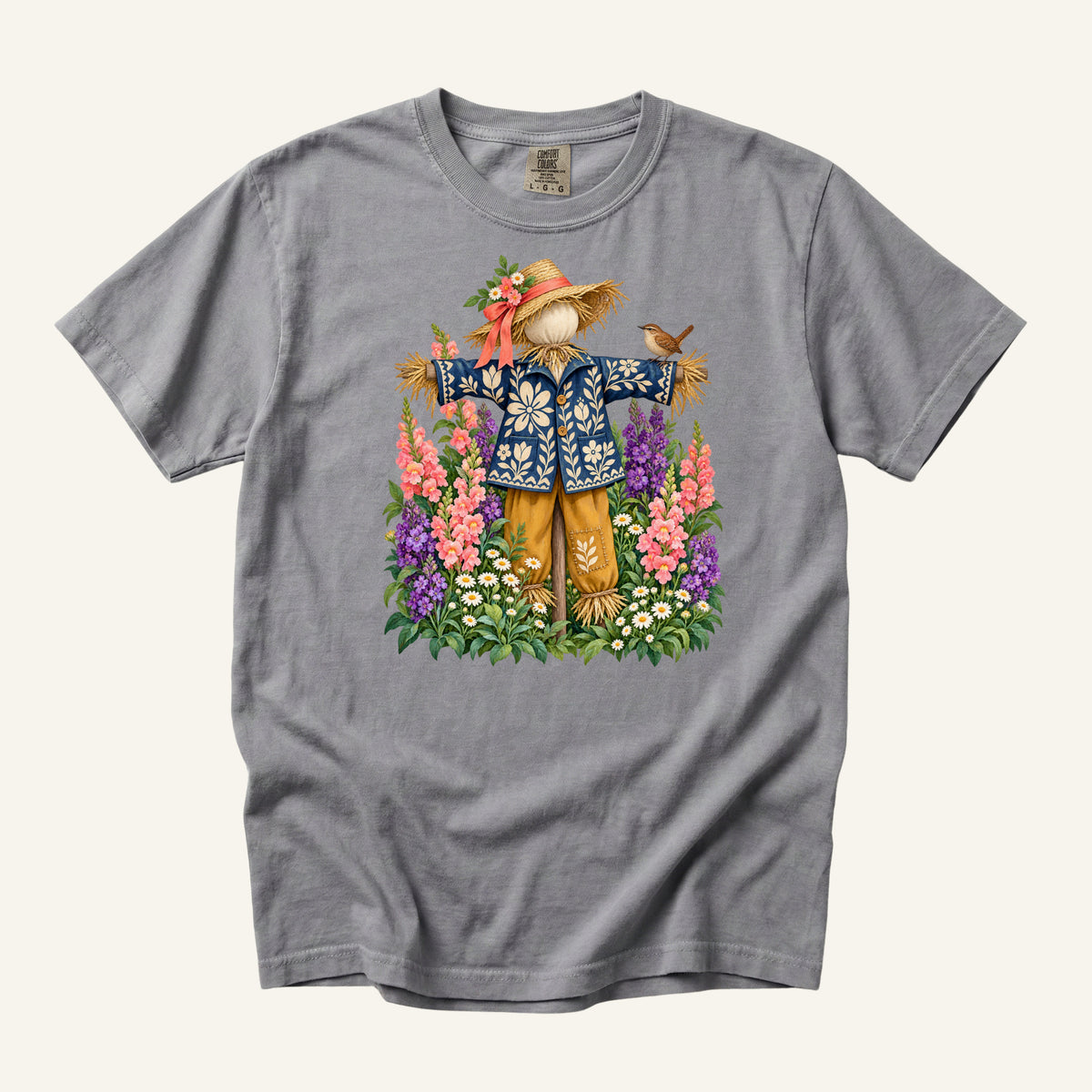 He Let Them Stay T-Shirt in Grey — a quiet neutral letting the pink, purple and blue details lead, runs S to 3XL