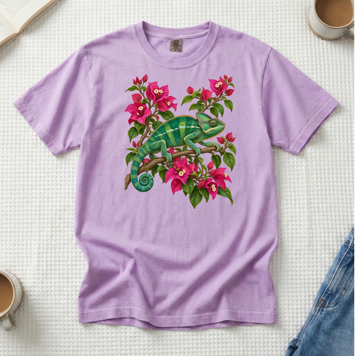 Hiding in Full Bloom chameleon and bougainvillea t-shirt in Orchid, a soft lavender — green chameleon among vivid pink bougainvillea, garment-dyed Comfort Colors 1717 tee
