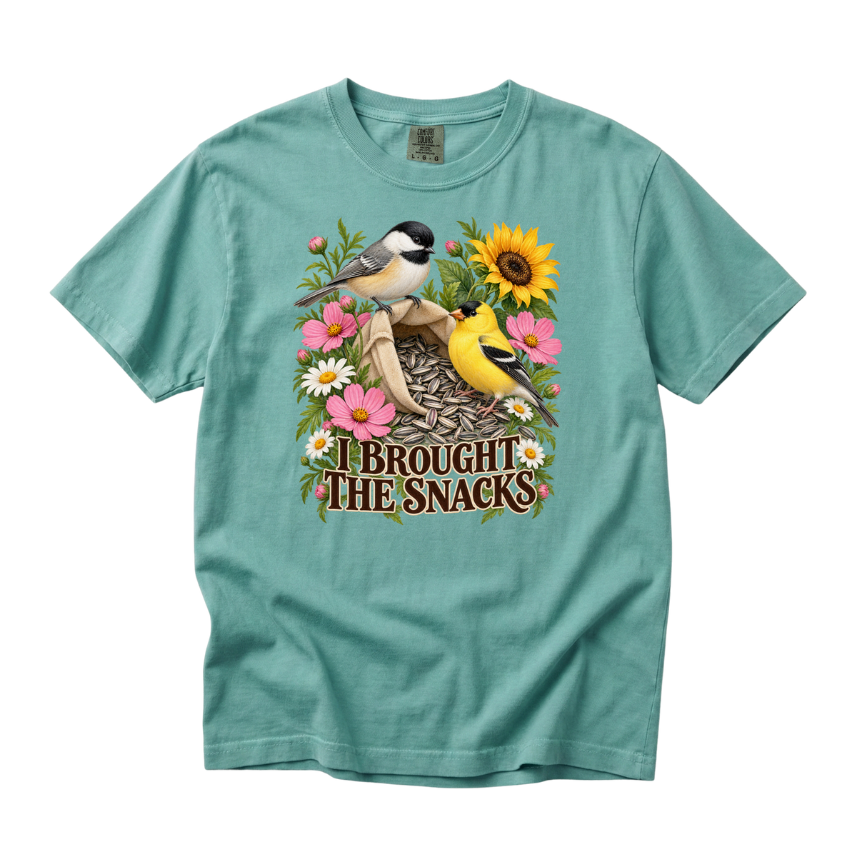 I Brought the Snacks tee in Chalky Mint, a chickadee and goldfinch at an open seed bag