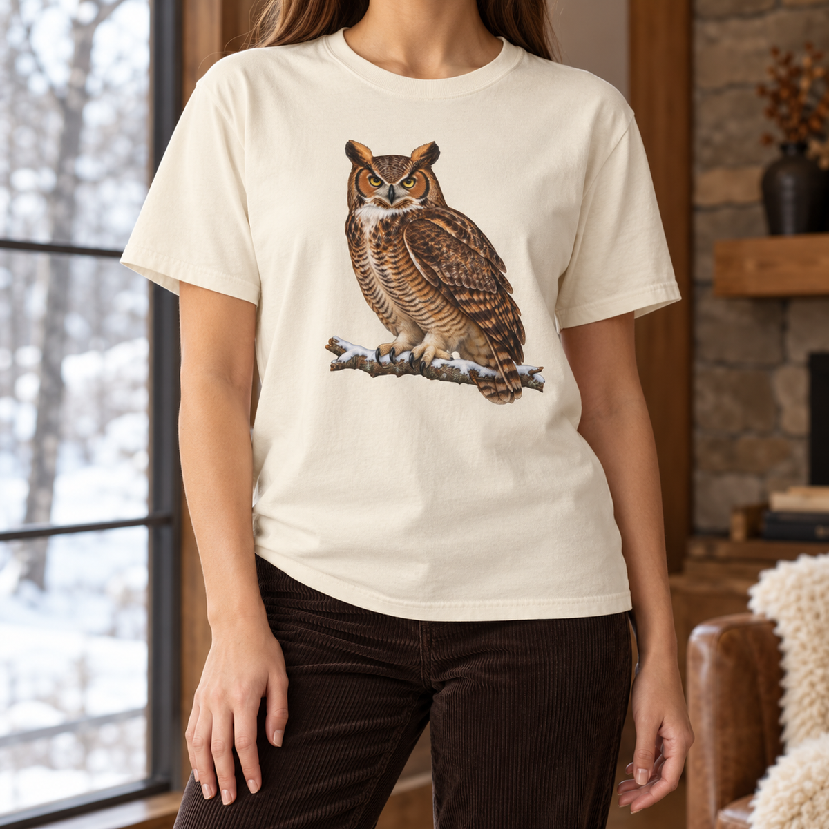 Great horned owl t-shirt in Ivory by a winter window – the watercolor owl on a snowy branch on a warm off-white Comfort Colors tee