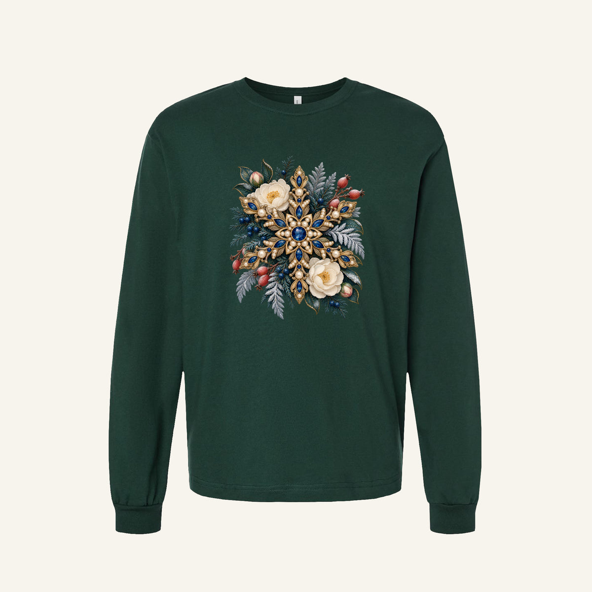 Jeweled Snowflake and Winter Florals Long Sleeve Tee in Forest — an ornate golden snowflake set with deep blue gemstones and pearl-like details, among cream flowers, pink buds, red berries and frosted evergreen branches