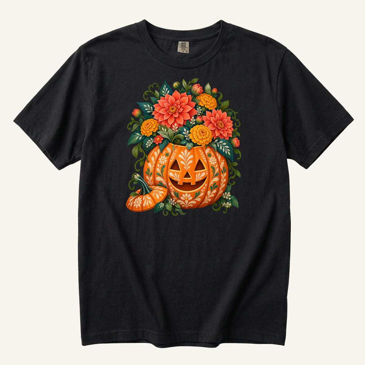 Floral jack-o'-lantern filled with coral and golden flowers on a Black Comfort Colors t-shirt