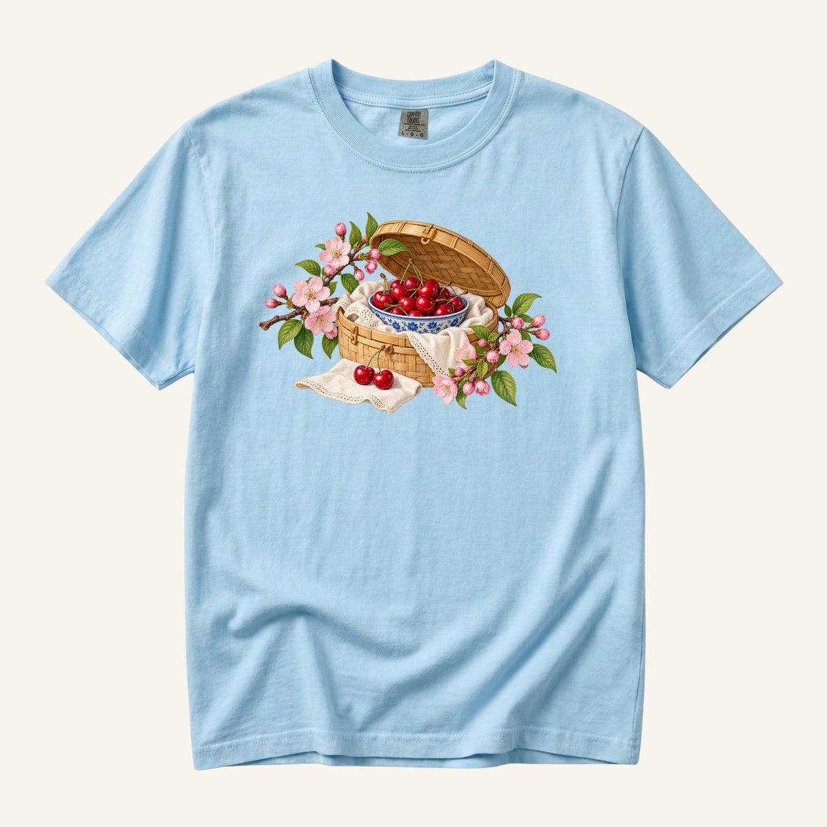 Leave the Afternoon Open tee in Chambray, cherries in a blue-and-white bowl on light blue
