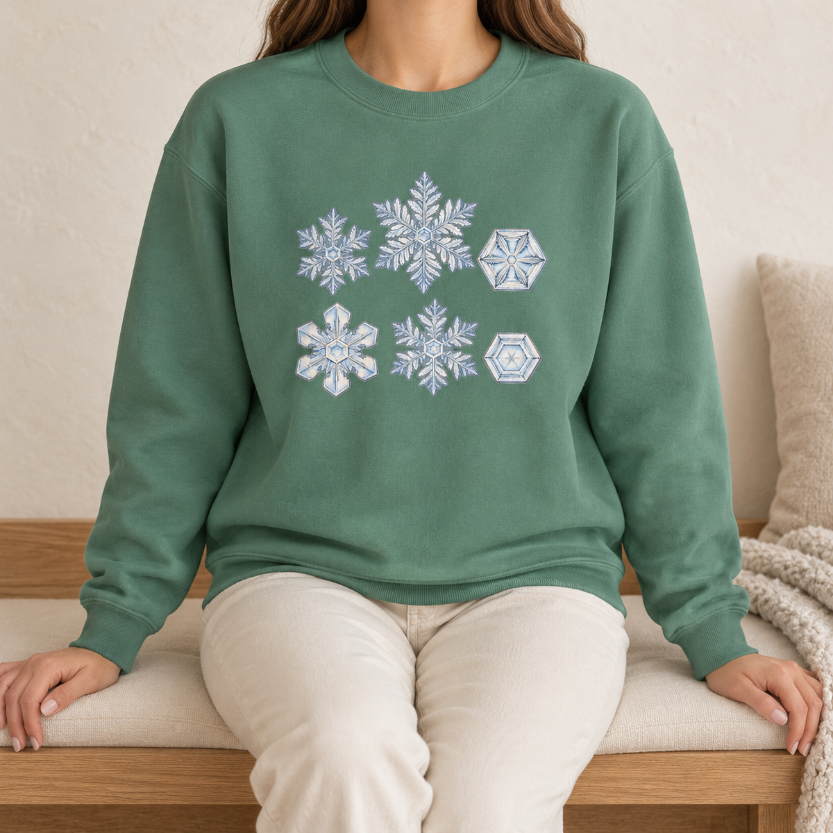 Snowflake Study Sweatshirt in Light Green - six watercolor snow crystals on a washed sage Comfort Colors crewneck, worn by a woman