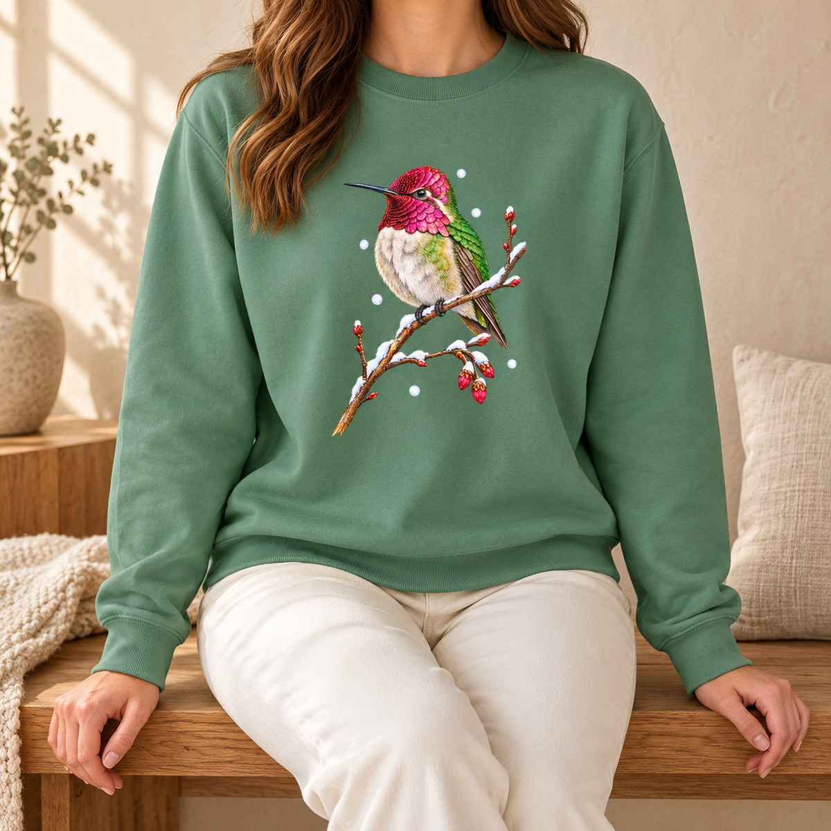 Winter Hummingbird Sweatshirt in Light Green - a watercolor Anna's hummingbird with a magenta head perched on a snowy twig, printed on a garment-dyed Comfort Colors 1566 crewneck