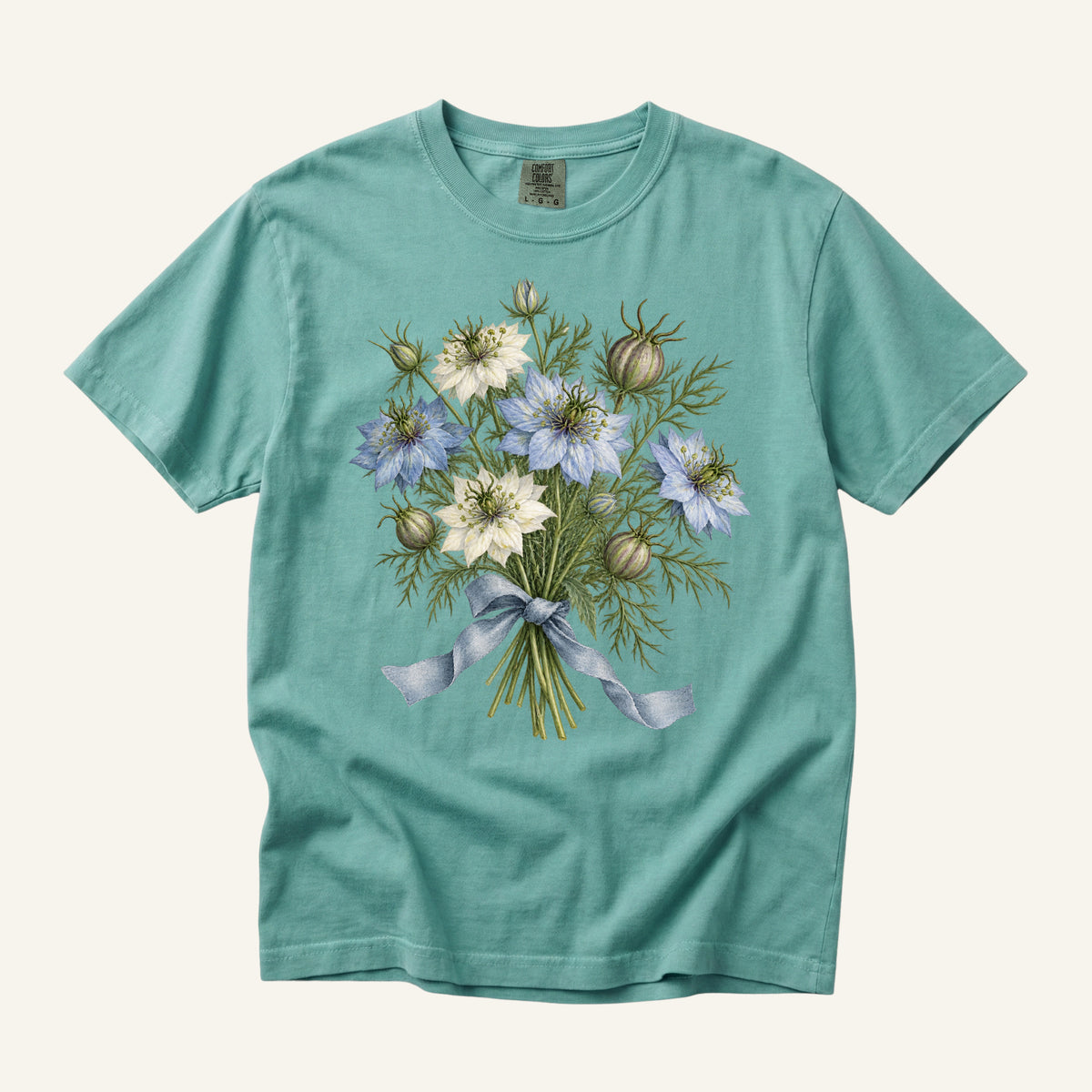 Love-in-a-Mist Floral T-Shirt in Chalky Mint — pale blue and cream nigella flowers with feathery foliage, seed pods and a dusty blue bow