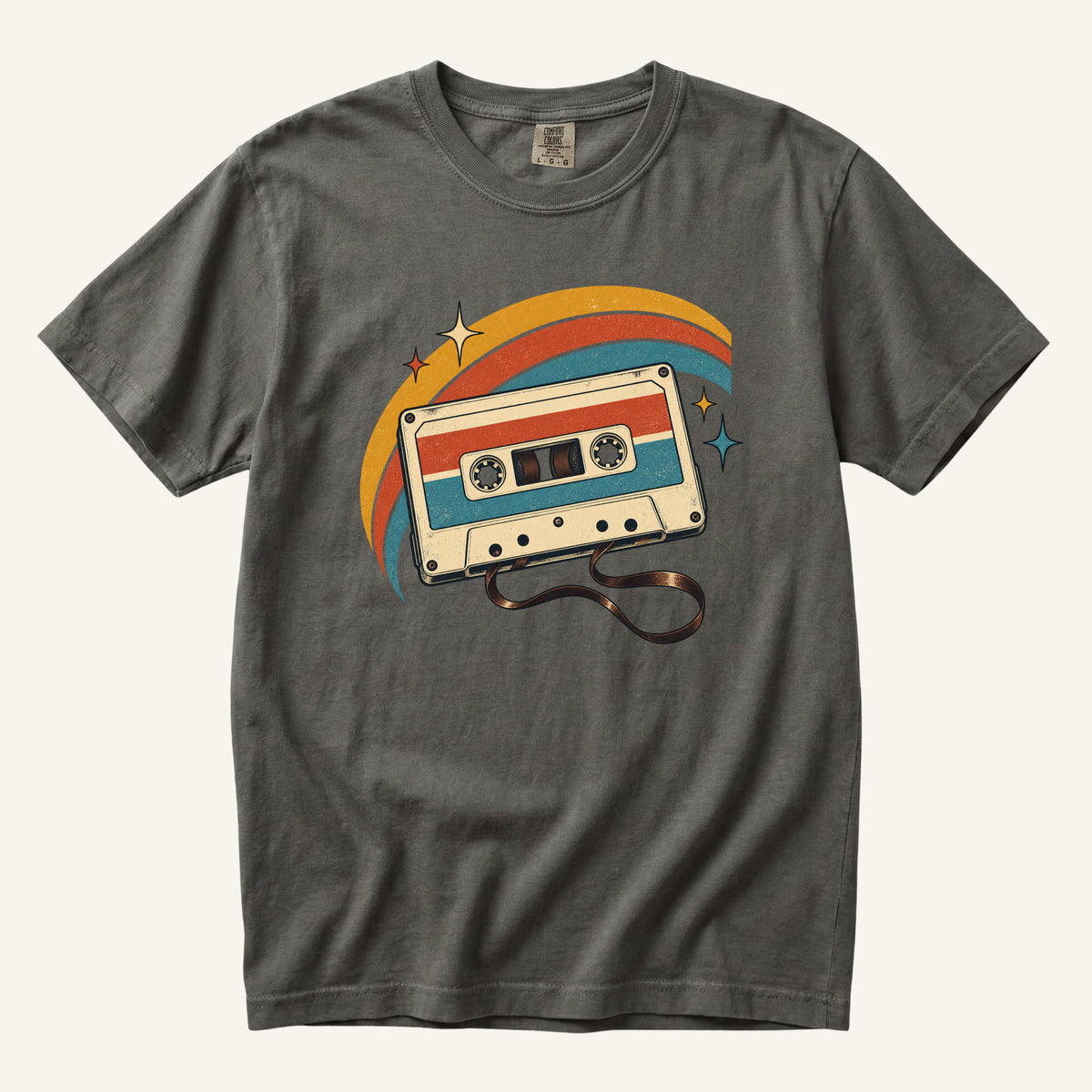 Made You a Mixtape T-Shirt in Pepper — a retro cassette with loose ribbon, rainbow stripes and starbursts
