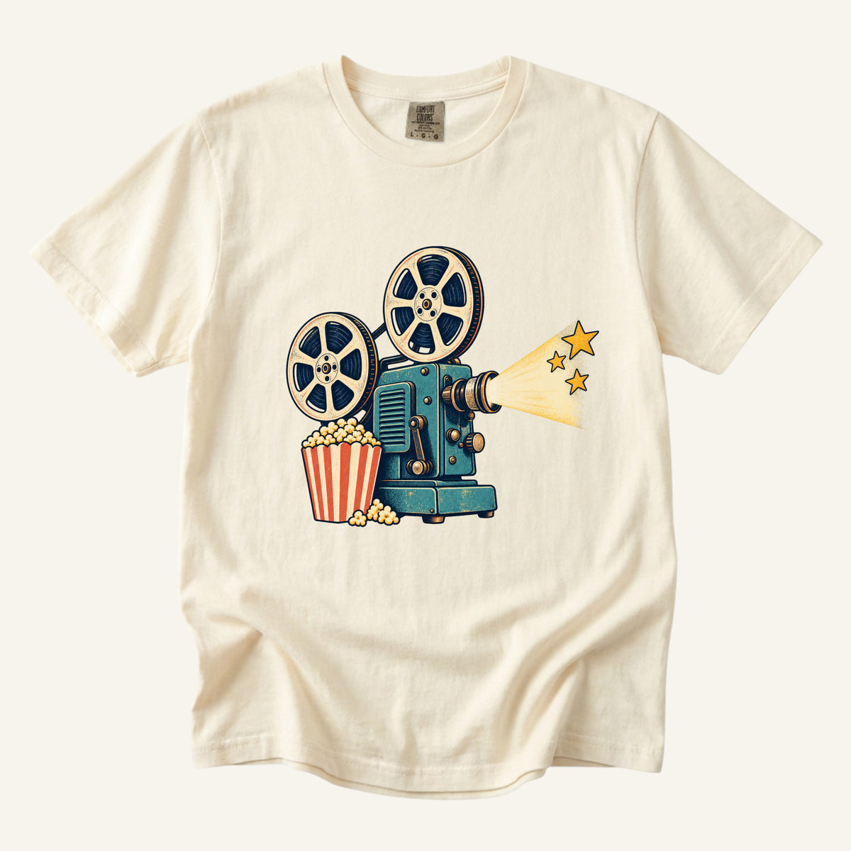 Meet Me at the Movies T-Shirt in Ivory — an old movie-poster feel for the retro projector design
