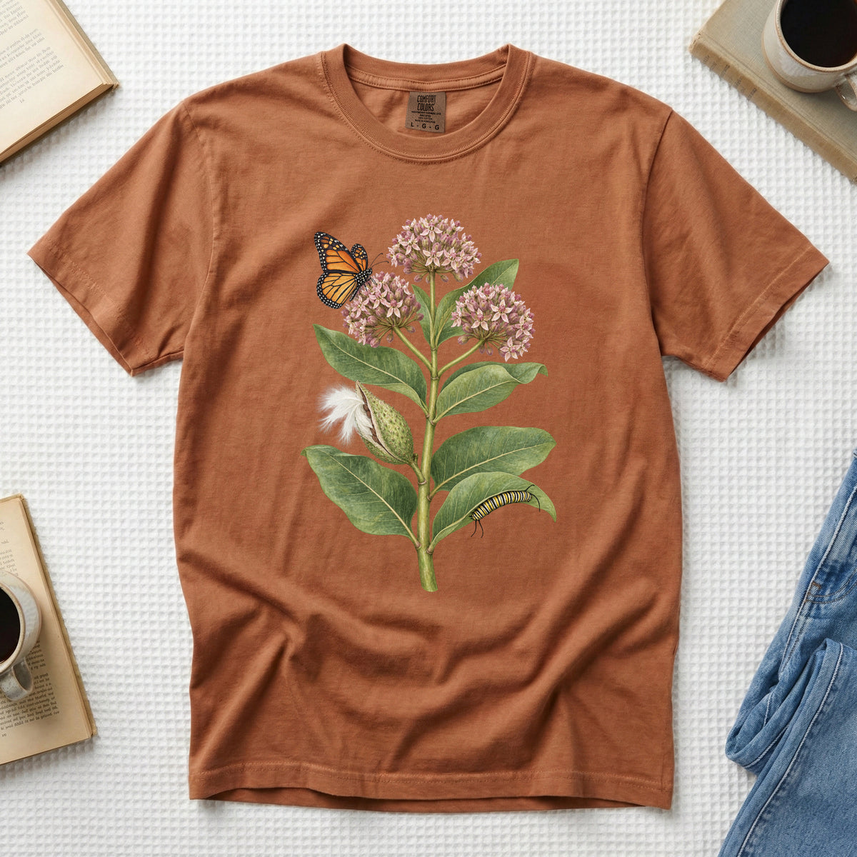 Milkweed & Monarch T-Shirt in Yam — common milkweed in flower with a monarch butterfly on garment-dyed cotton