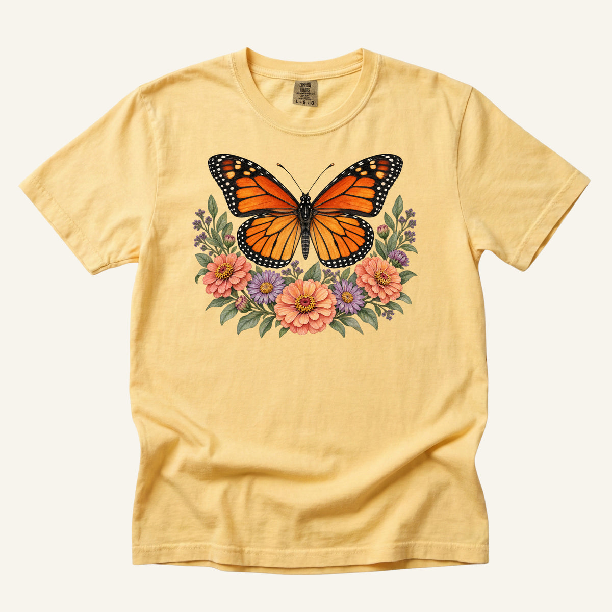 Monarch & Wildflowers T-Shirt in Butter — monarch and botanical watercolor artwork, centered front print
