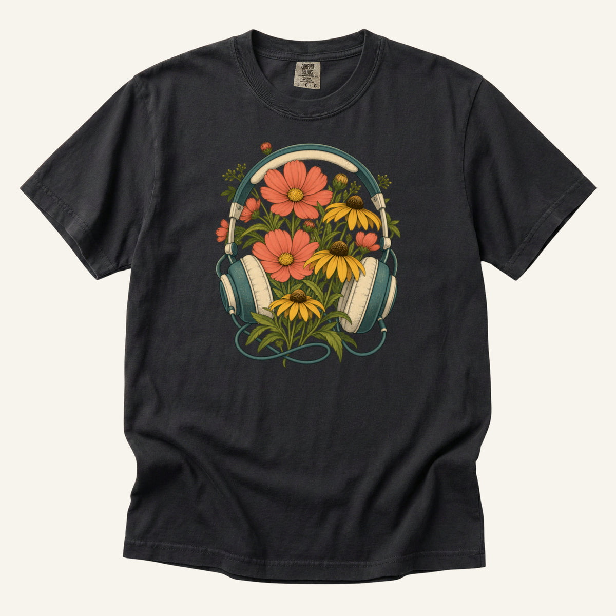 On Her Own Frequency T-Shirt in Graphite — a quiet neutral bringing the orange blooms and cream ear cushions forward