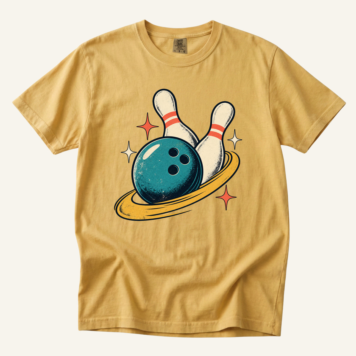 One More Frame T-Shirt in Mustard — warm gold echoing the golden ring in the artwork