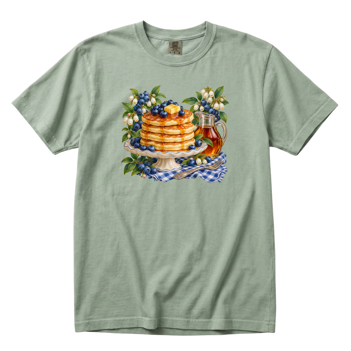 One More Pancake tee in Bay, a vintage blueberry pancake breakfast print on soft sage green