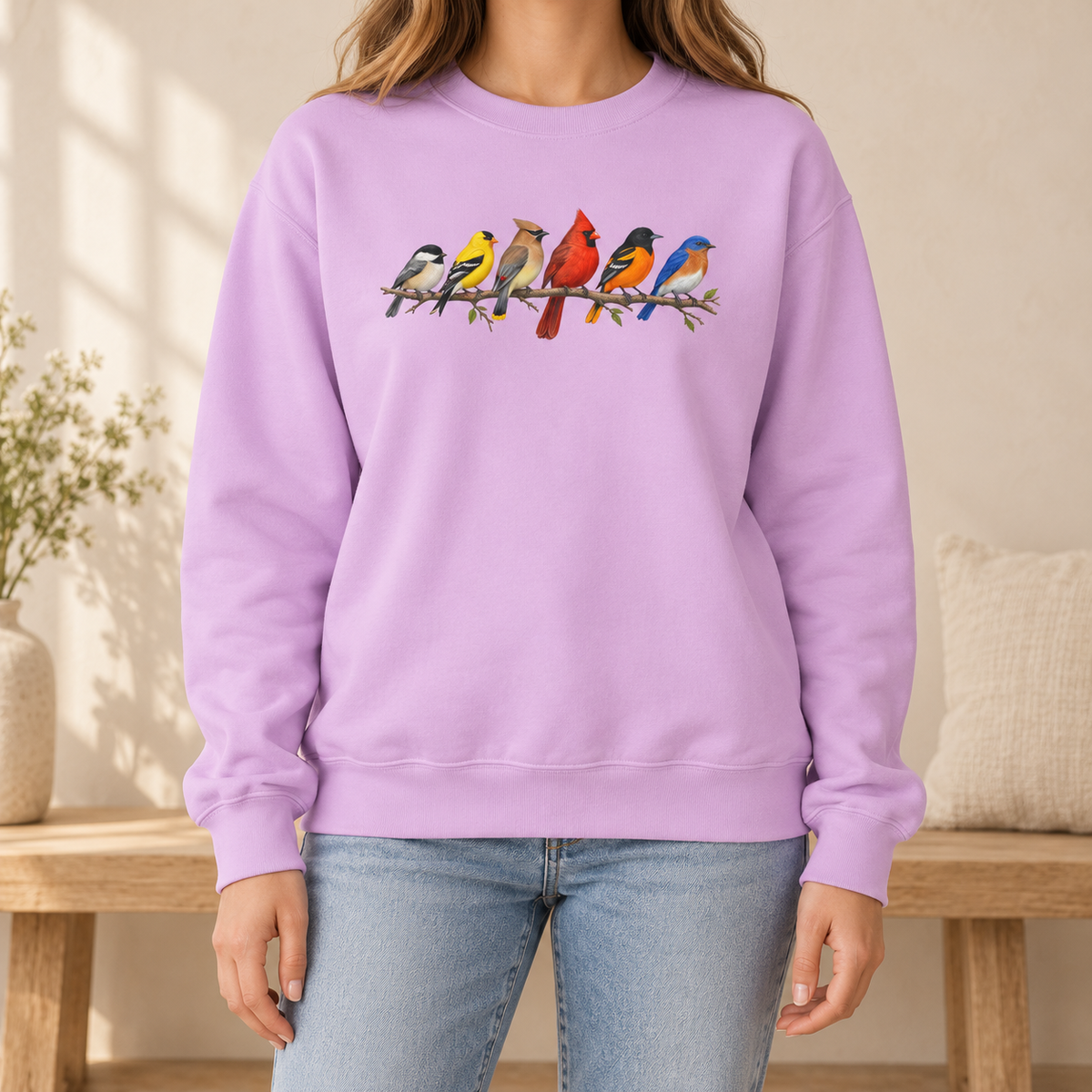 Colorful Birds on Branches sweatshirt in Orchid — six painted songbirds on one branch: chickadee, goldfinch, cedar waxwing, northern cardinal, Baltimore oriole and eastern bluebird, on a garment-dyed Comfort Colors crewneck