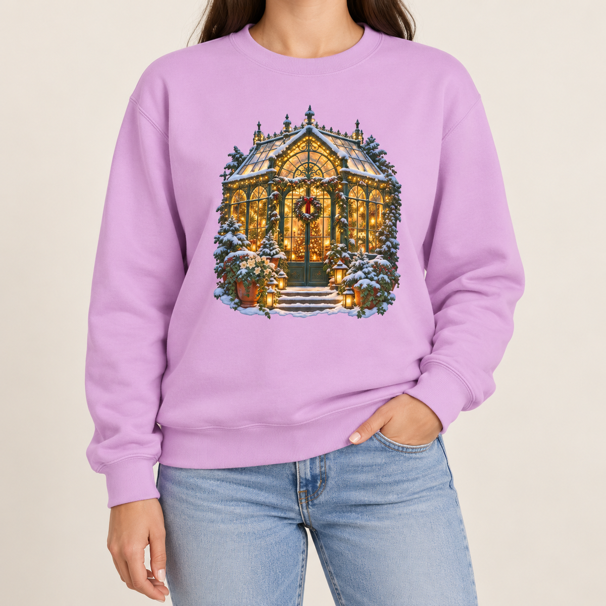 Christmas greenhouse sweatshirt in Orchid: a snowy Victorian conservatory glowing with warm lights on a light lavender garment-dyed Comfort Colors crewneck