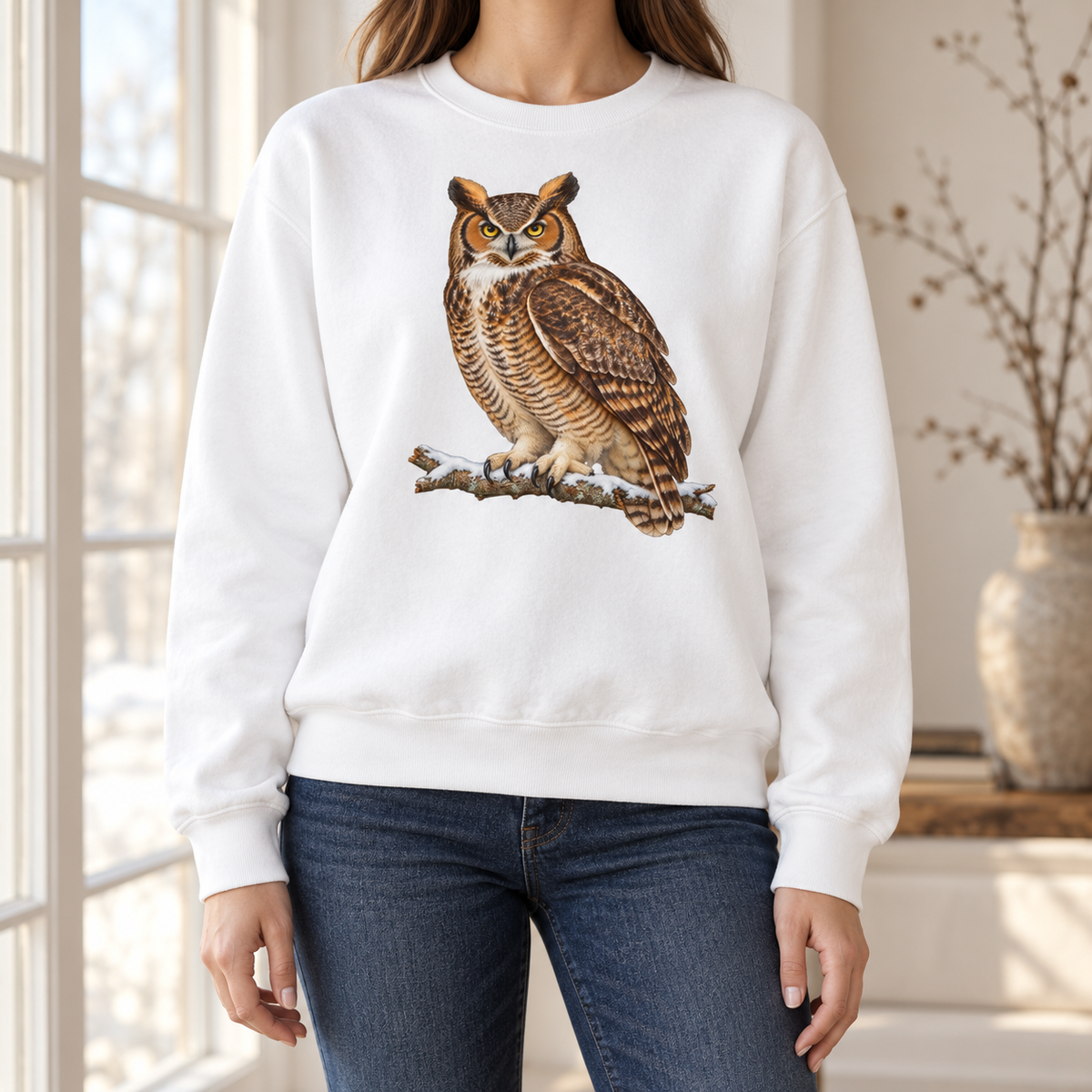 Great horned owl sweatshirt in Blue Jean in soft window light – watercolor owl on a snowy branch on a light washed denim Comfort Colors crewneck