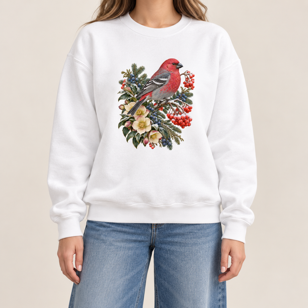 Winter bird botanical design on a brushed fleece interior crewneck, printed not embroidered — a bright red bird among evergreen sprigs, red and blue berries and cream flowers