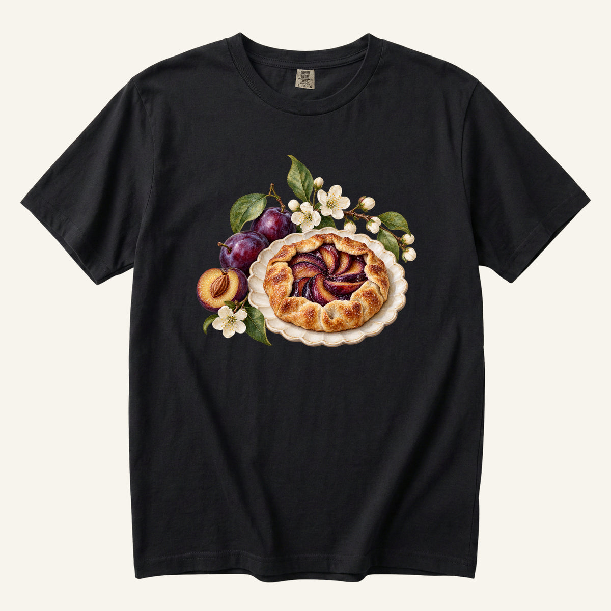 Saved You a Slice T-Shirt in Black — the golden pastry and pale blossoms at full contrast