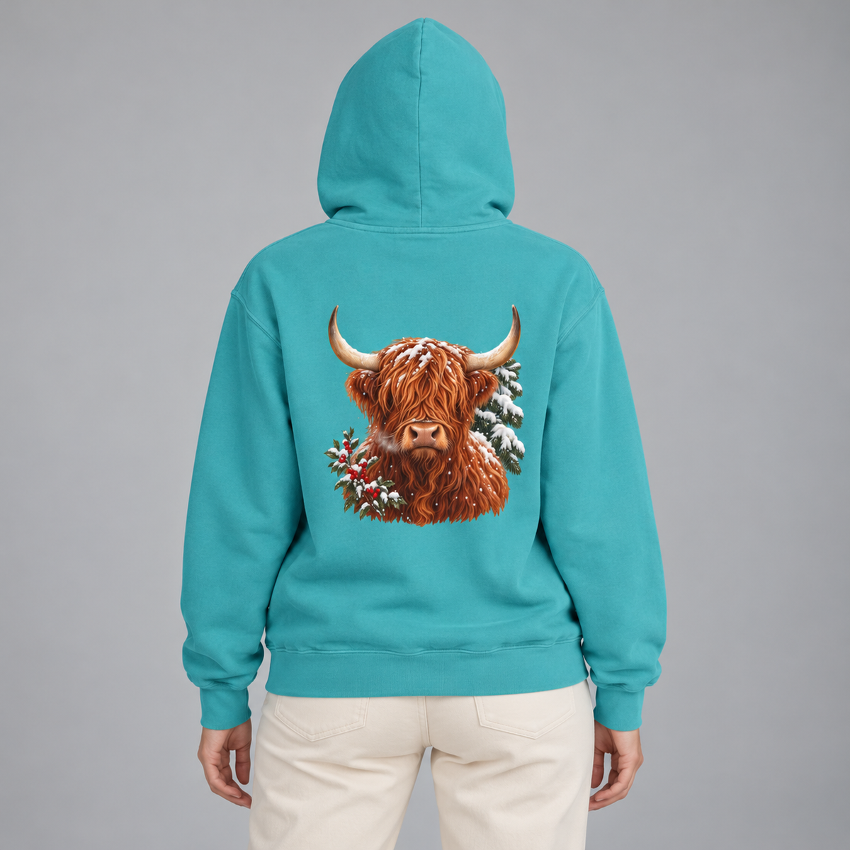 Winter Highland Cow hoodie in Seafoam worn, back view with the highland cow portrait