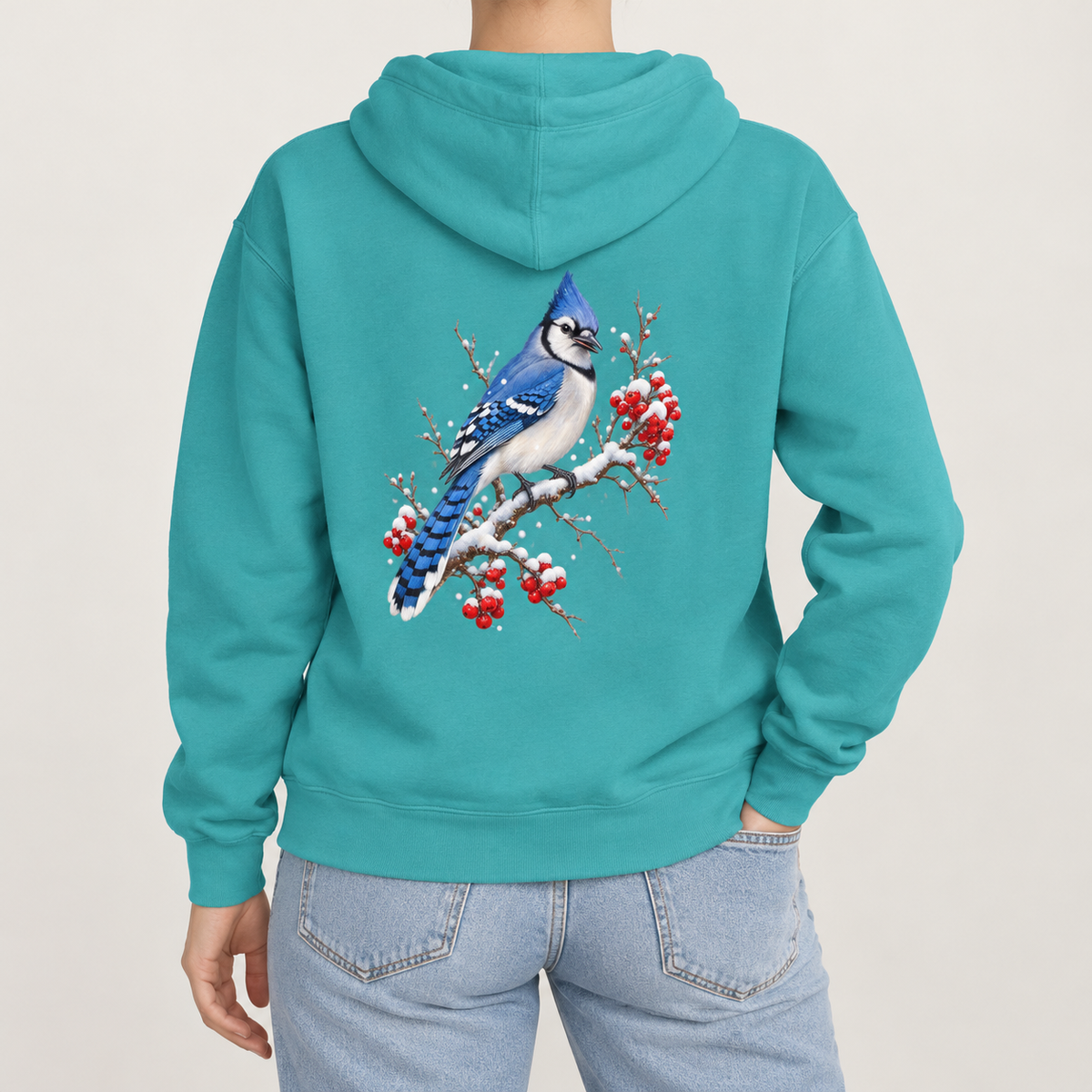 Blue Jay Winterberry hoodie in Seafoam, worn, back view of the blue jay and winterberry print