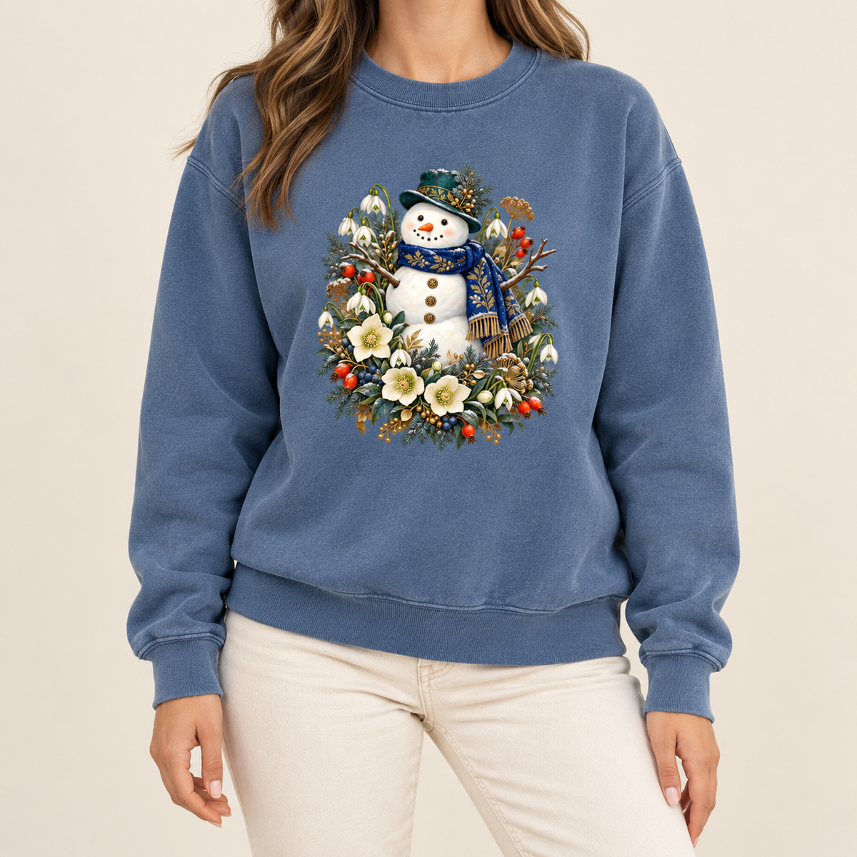 Snowman and winter botanicals sweatshirt, relaxed unisex fit, adult sizes S to 3XL — a smiling snowman in a dark hat and blue scarf among evergreen, red berries and cream flowers