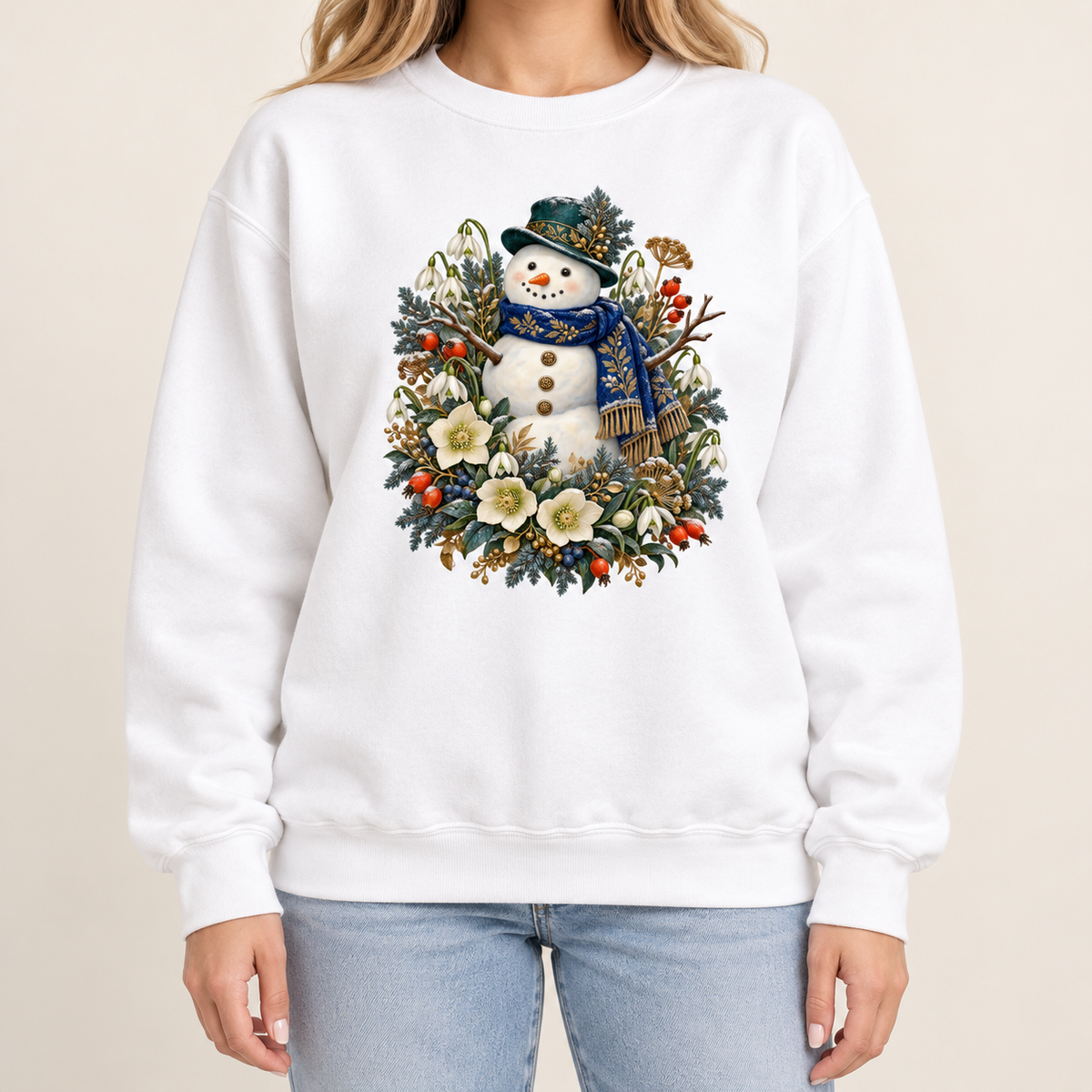 Vintage botanical snowman design on a side-seamed Comfort Colors 1566 crewneck — a smiling snowman in a dark hat and blue scarf among evergreen, red berries and cream flowers