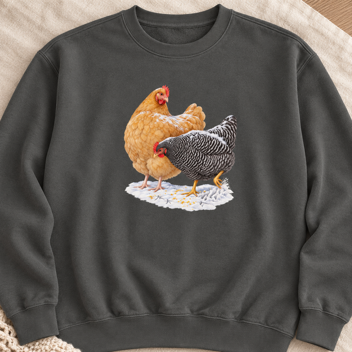 Winter hens sweatshirt in Pepper, flat view – the snowy hens print on a washed charcoal Comfort Colors crewneck